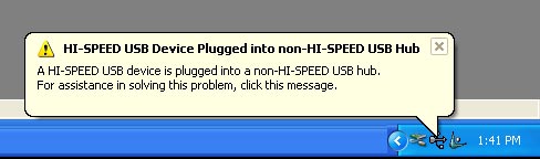 Figure 1. Windows XP warns you of a mismatch between a Hi-Speed USB (USB 2.0) device and a USB 1.1 port.